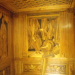 9) Una delle pareti lignee dello Studiolo del Duca
