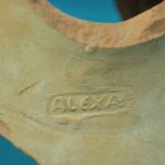 Parte superiore di un’anfora con marchio “ALEXA” presso il cantiere di scavo Navi Antiche di Pisa (Antonacci, 2015)